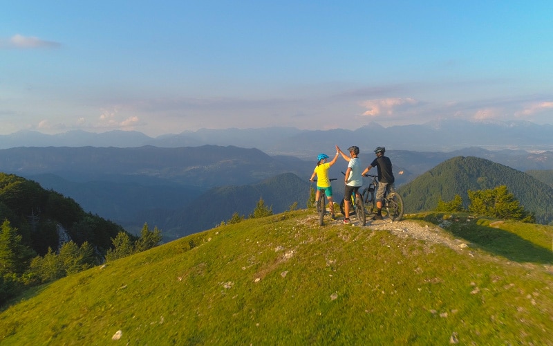 Slovenian e-bike holidays bikers on the top of a hill