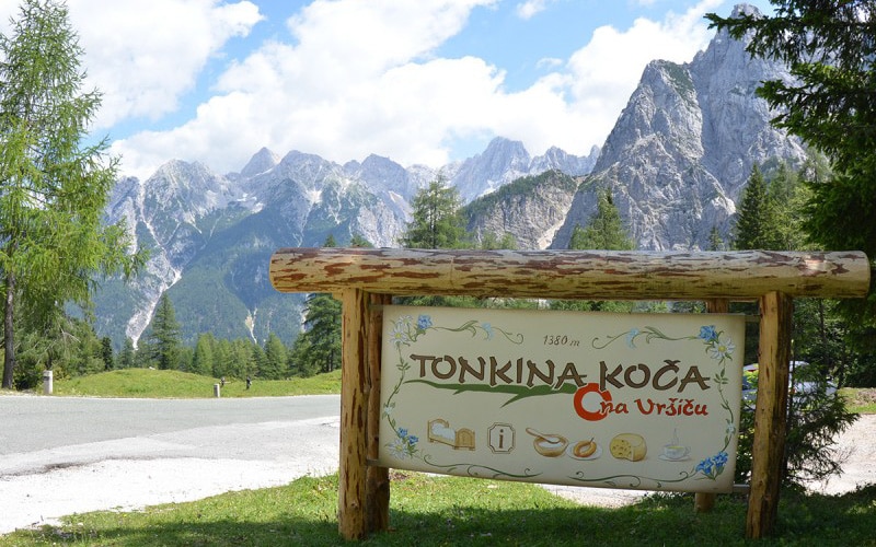 Tonkina koča na Vršiču the sign in front of the cottage